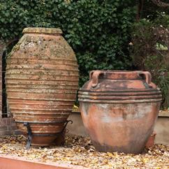 A 19th Century Terracotta Jar on Wrought Iron Stand