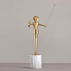 A Brass Figurative Table Sculpture On Marble Base