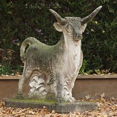 A Carved Limestone Steer By Talisman