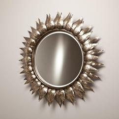 A Contemporary Beaten Metal Sunburst Mirror 