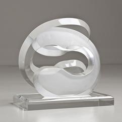 A Lucite Swirl Shaped Table Sculpture signed Michael Ogius
