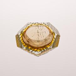 A Mandruzzato Sommerso Glass Ashtray with a Lemon Centre