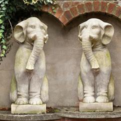 A Pair of Carved Limestone Elephants by Talisman