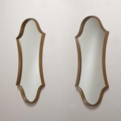 A Pair of Gold Hollywood Regency Keyhole Mirrors