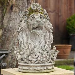 A Rare Pair of Mid 19th Century Composition Stone Lions