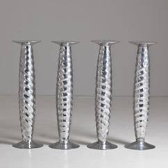 A Set of Four Aluminium Columns signed David Alan Jones