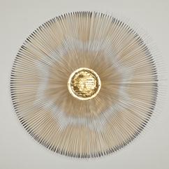 A Starburst Metal Wall Sculpture USA 1970s