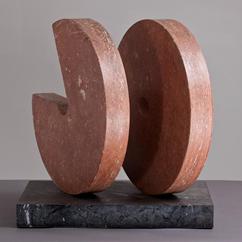 A Stone and Marble Disc Sculpture stamped Jaffe