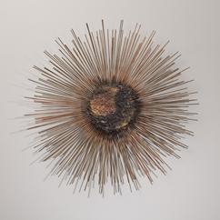 A Superb Starburst Metal Wall Sculpture USA 1970s