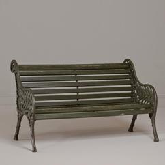 A Victorian Garden Bench with Cast Iron Ends in a Fern Pattern 